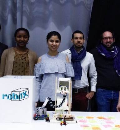 Echo zango, with her peers at a case competition during her time in the International MBA.